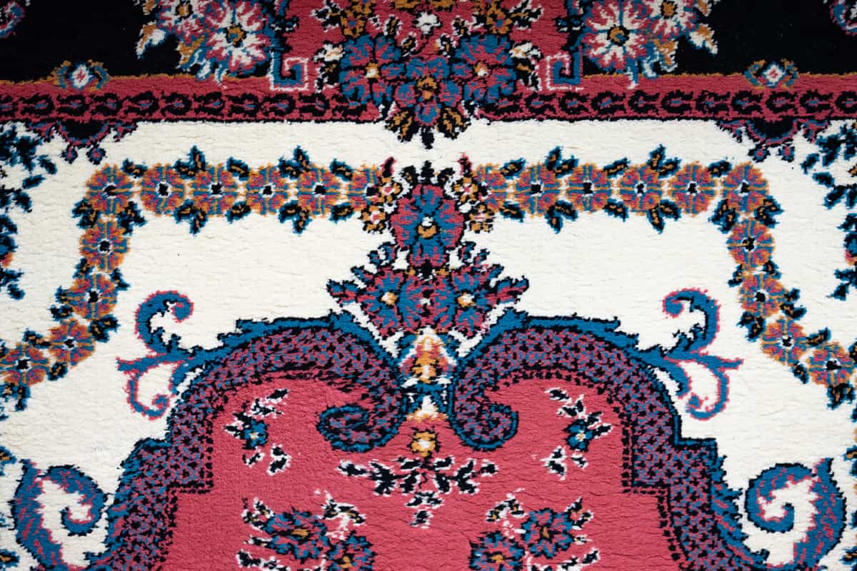 A traditional medallion-pattern rug anchoring a living room